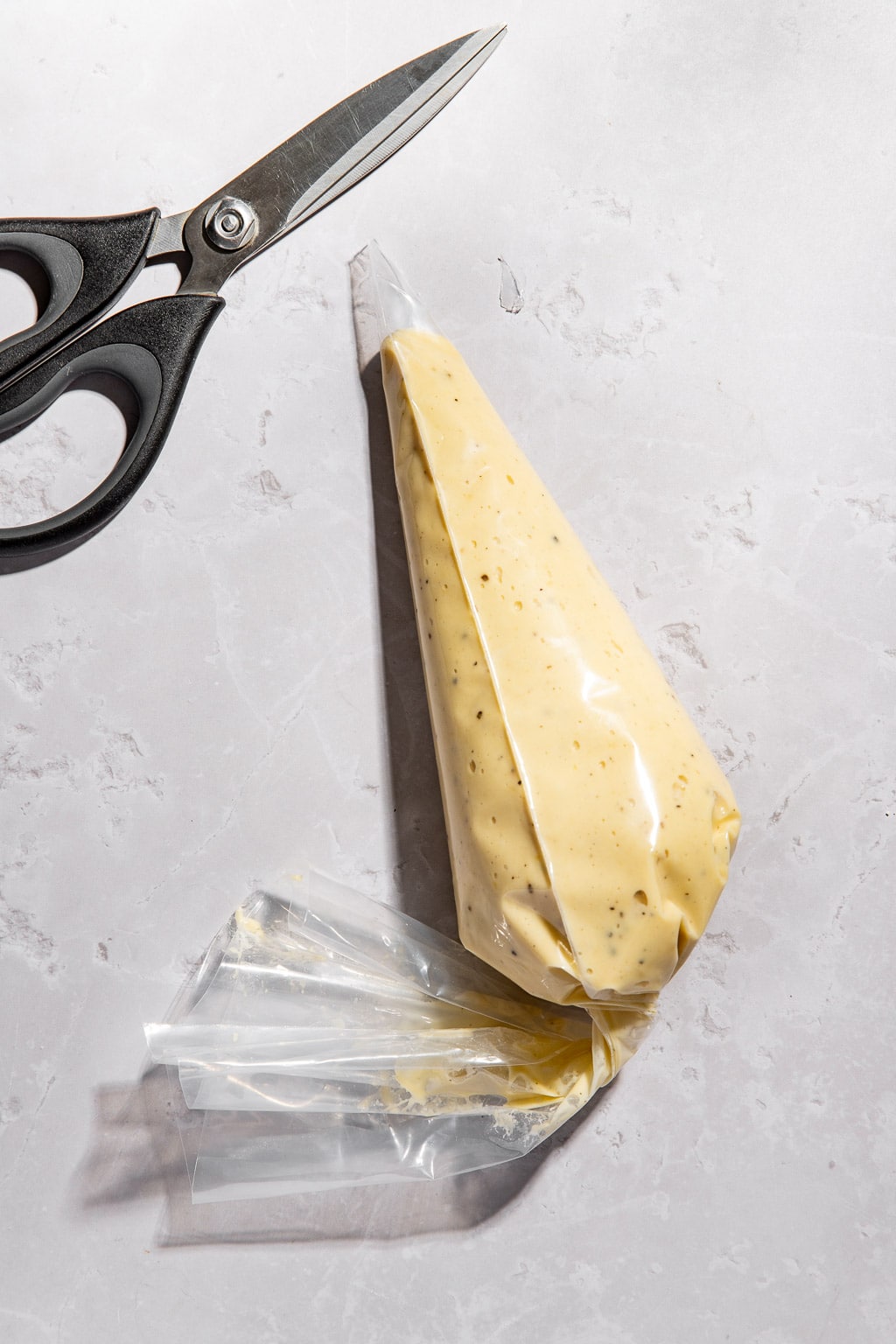 spaetzle batter in a piping bag