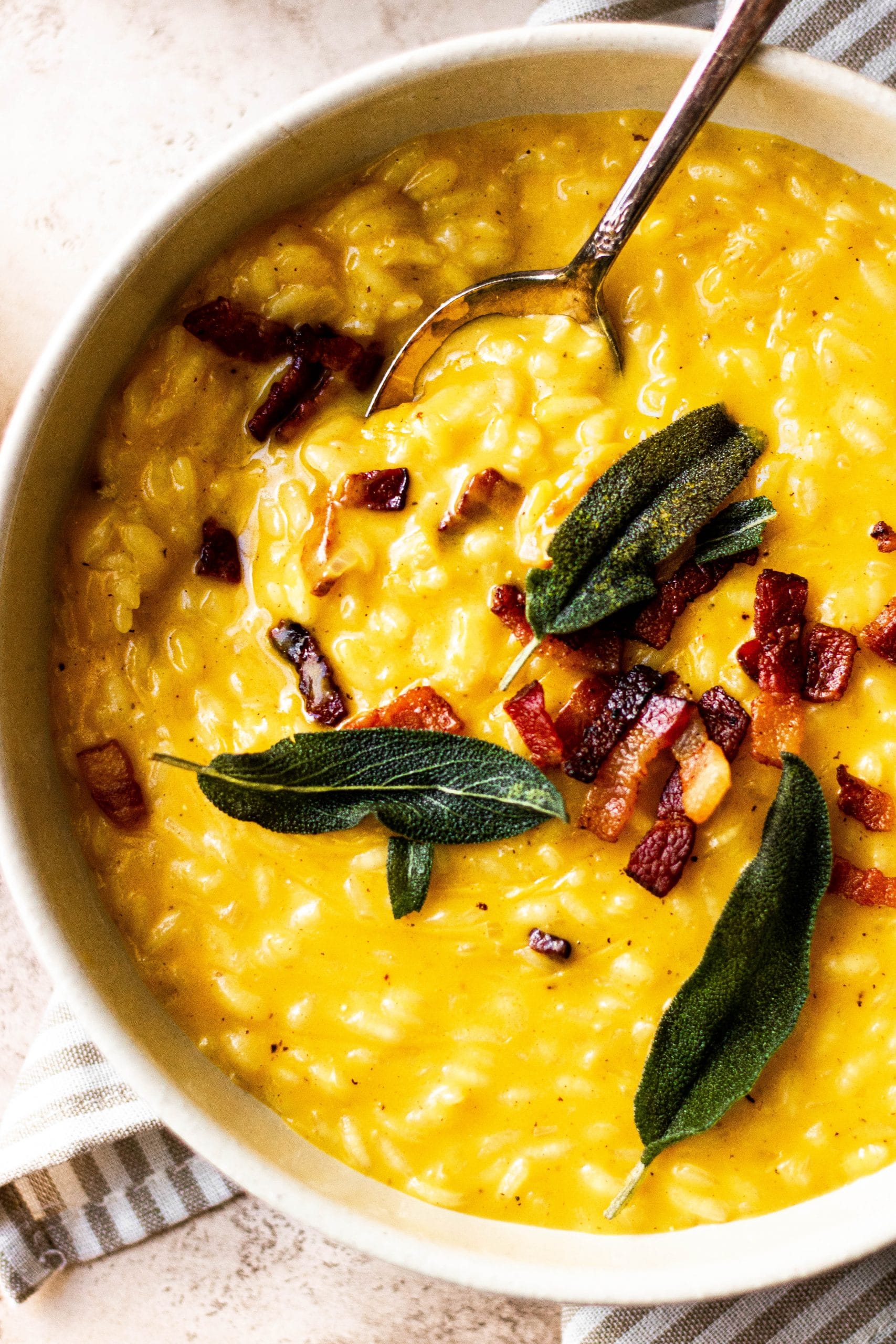 pumpkin risotto with bacon and sage on top