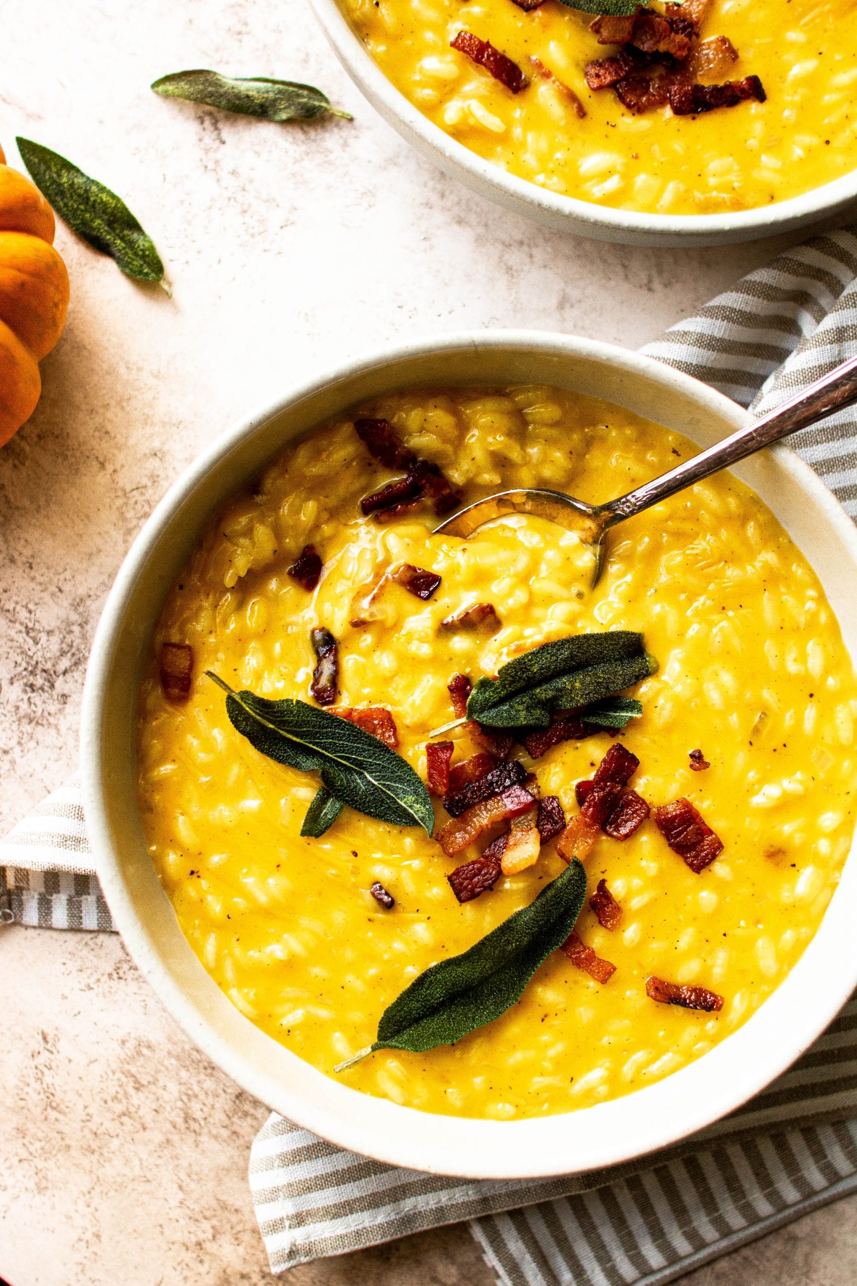 pumpkin risotto with bacon and sage on top