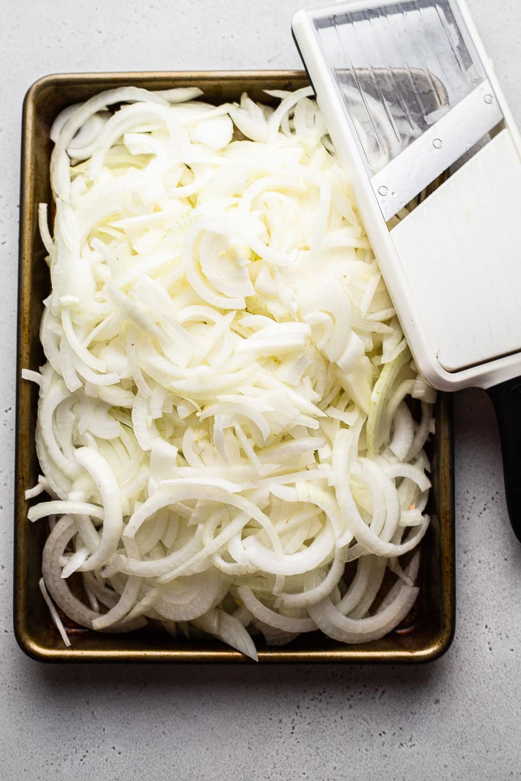Thinly sliced onions before caramelizing.