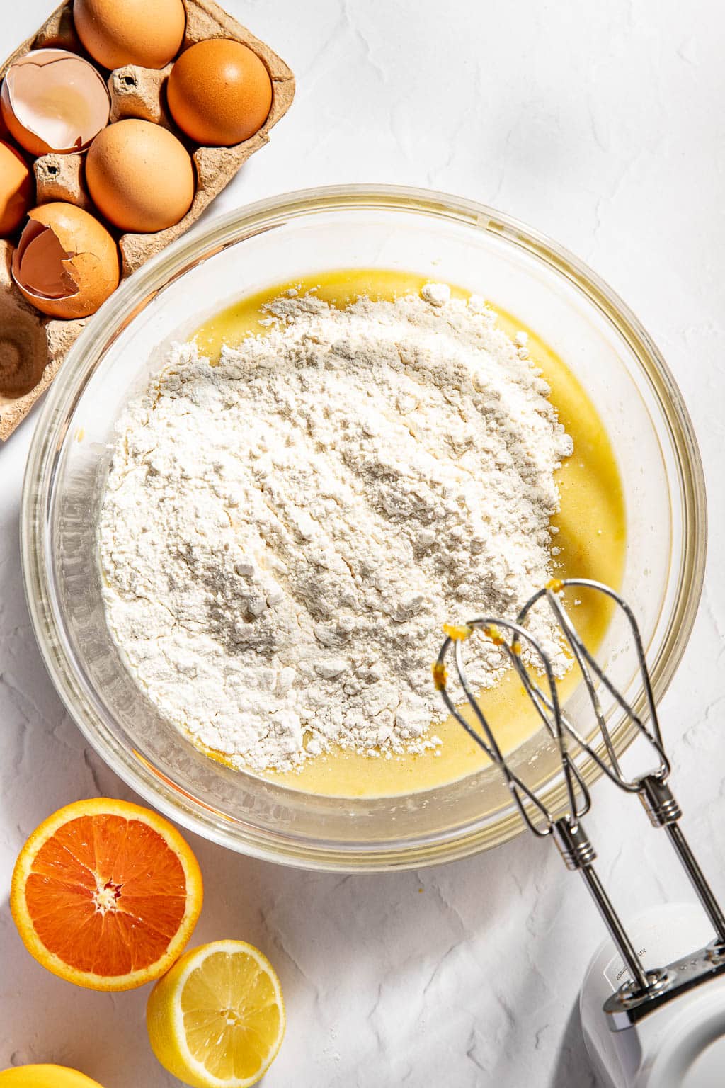 Mixing the dry ingredients into the olive oil cake batter