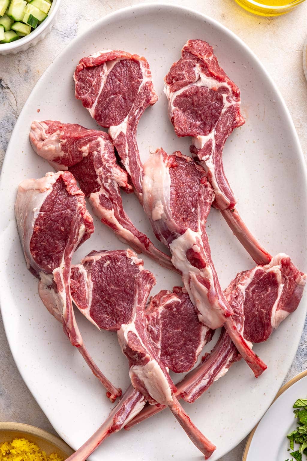 Lamb chops on a plate after being broken down