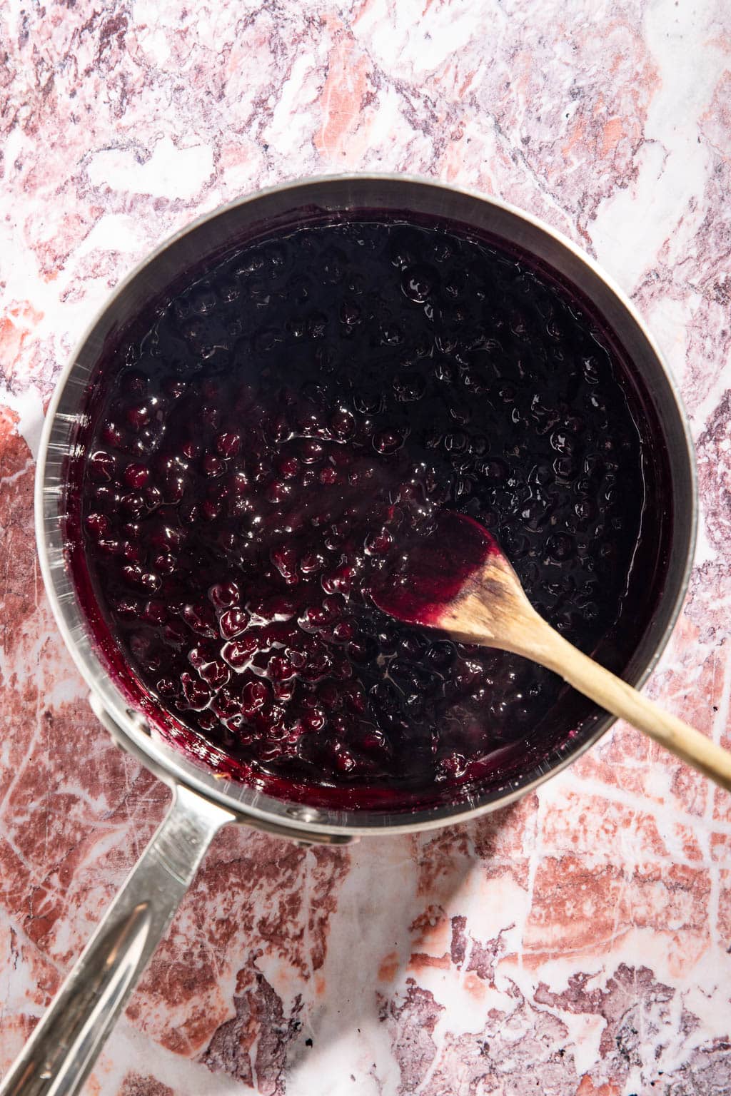 wild blueberry compote in a saucepan after cooking