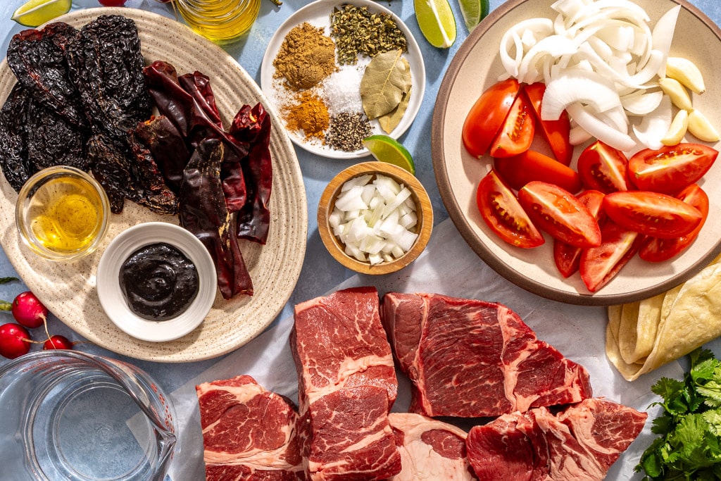 braised beef birria ingredients laid out