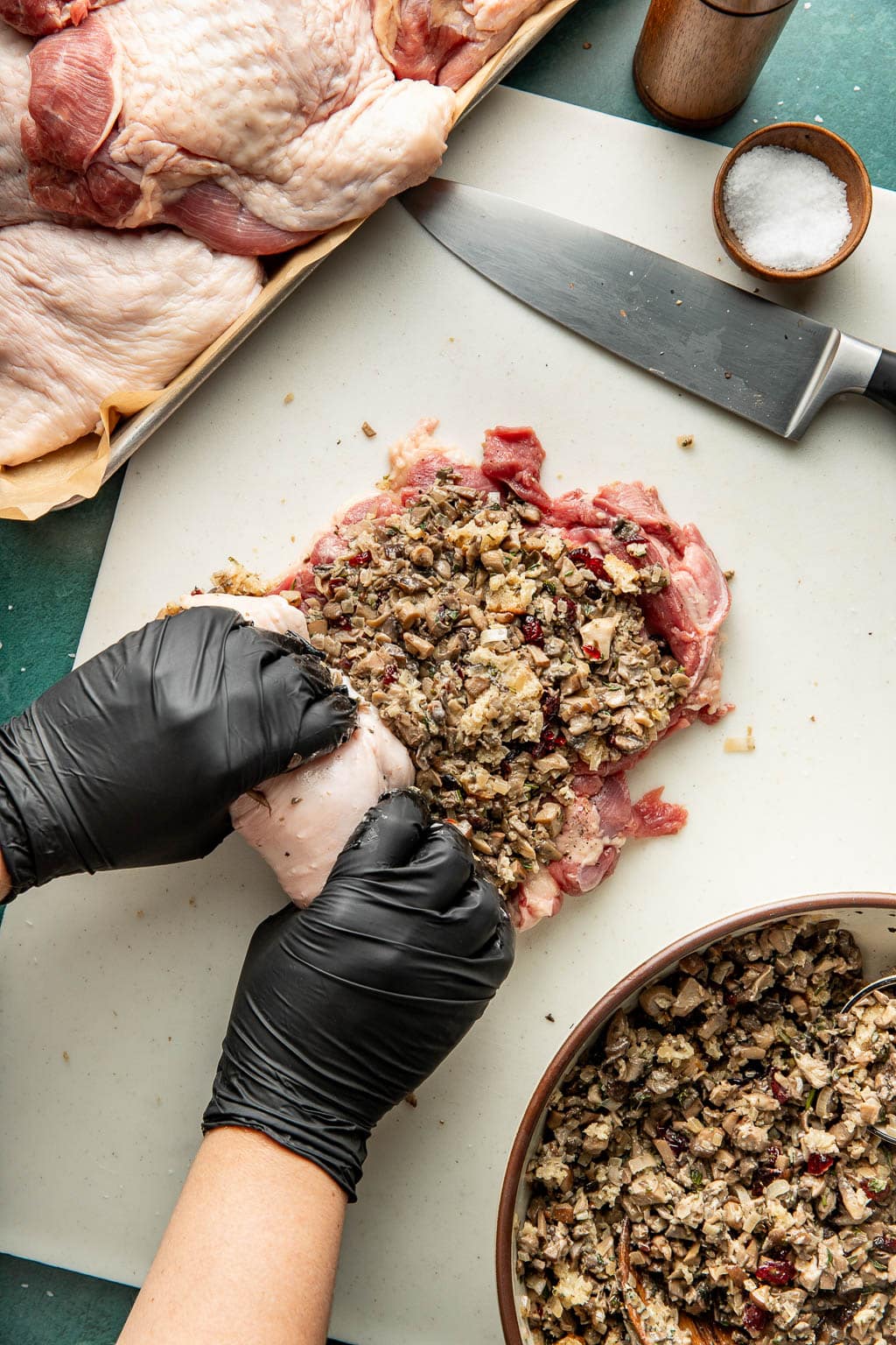 rolling up a turkey thigh
